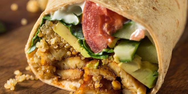 Tempeh veggie wrap, shot from the front so ingredients are displayed.